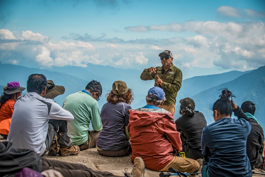 The guide monitors the group every day