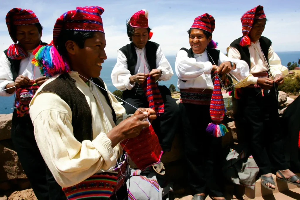 Men weaving chullos on Taquile Island