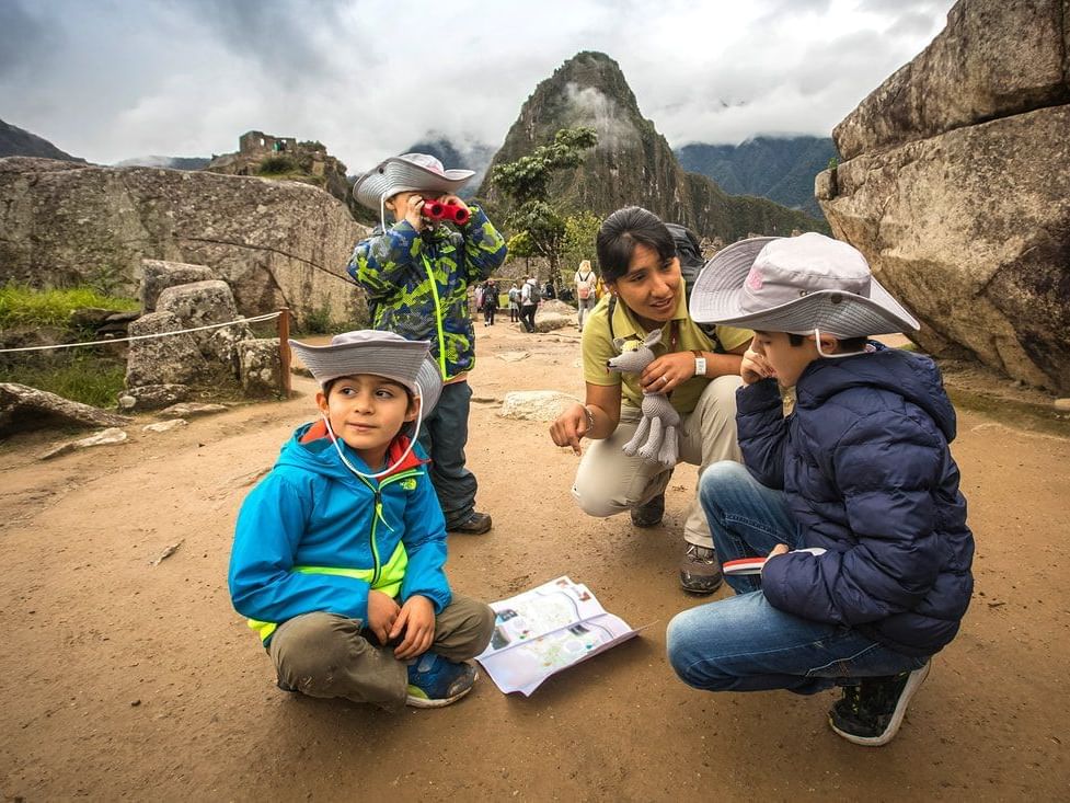 Children enjoying Machu Picchu